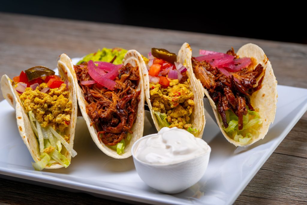 Authentic Mexican street tacos topped with freshly crumbled Queso Fresco cheese