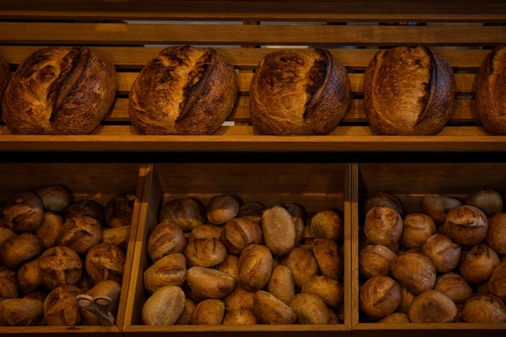 Industrial commercial bakery assembly line mass producing white sandwich bread