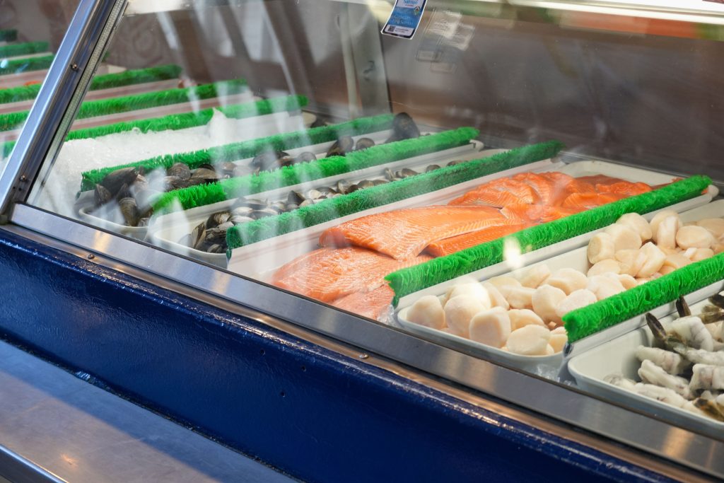 Clean supermarket seafood counter selling fresh poke in Hawaii